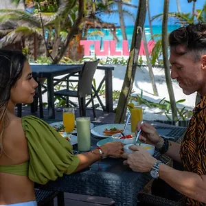 https://tita-tulum-hotel-ecologico.quintano-roohotels.com